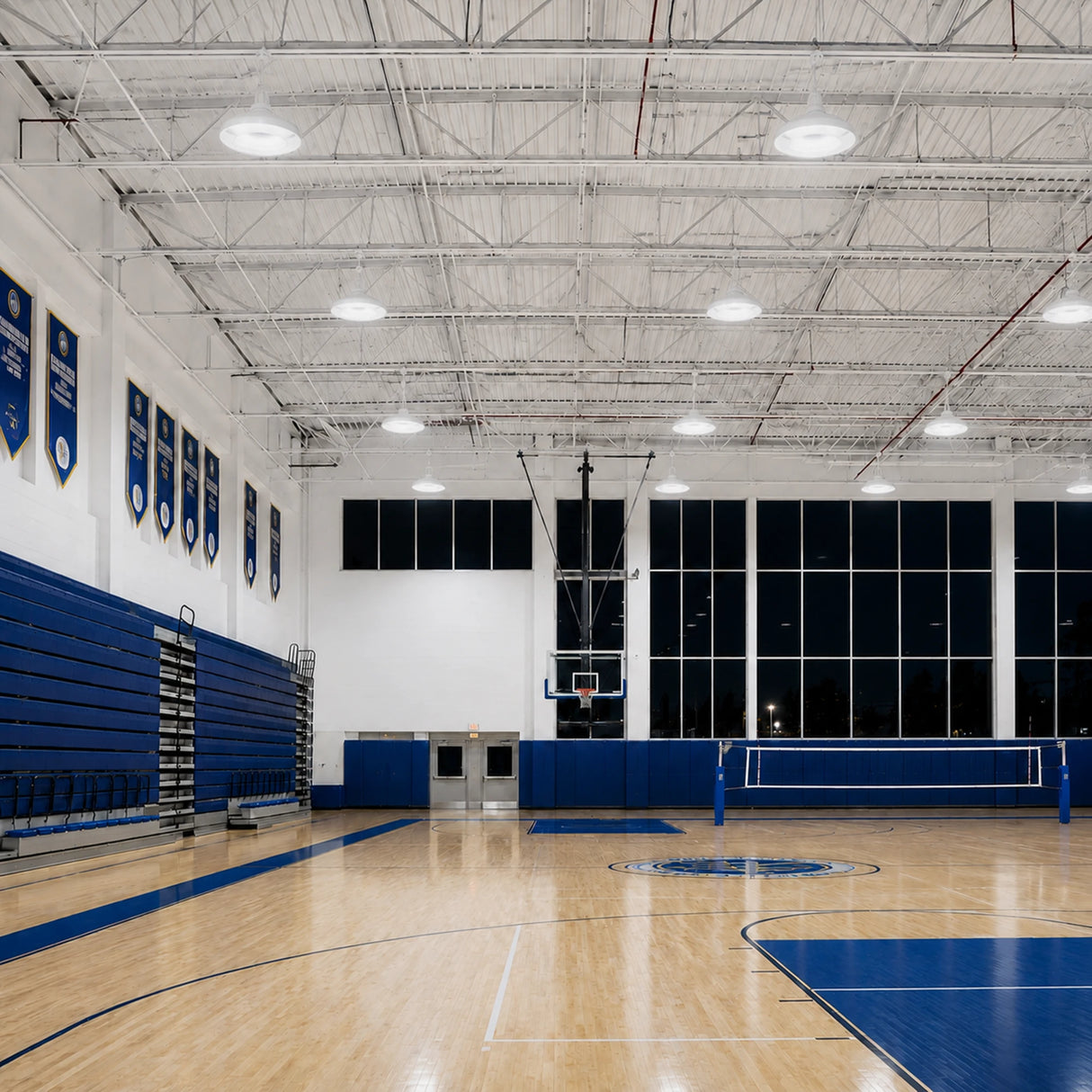 150W 21,900lm 5000K 120-277V 0-10V dimmable PC lens UFO LED high bay lights illuminate a gym.