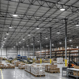 240W 36,240lm 5000K 277-480V UFO LED high bay lights illuminate a high-ceiling warehouse with pallet racks.