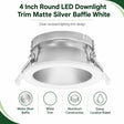 Round 4 inch LED downlight trim with matte silver baffle, white trim ring, and damp location rating