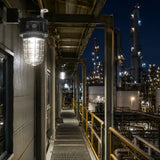 40W 4200lm LED explosion proof jelly jar light illuminating a refinery walkway at night