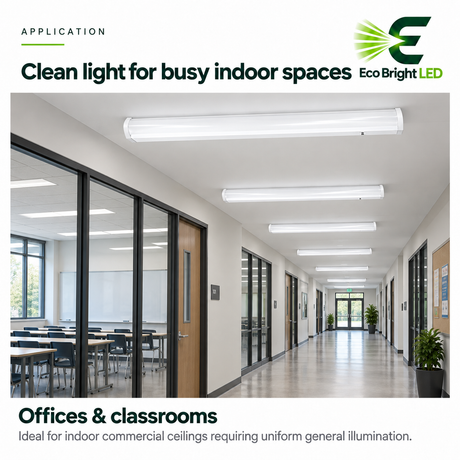 White 4-foot LED wraparound lights installed along an office and classroom hallway for uniform ceiling lighting