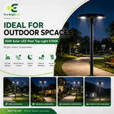 50W 5700K solar LED post top light illuminating a curved park pathway at night with benches and landscaping