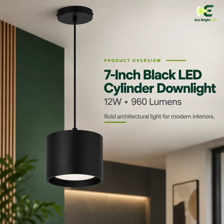 Black 7-inch 12W LED cylinder downlight with surface canopy shown in a modern interior setting