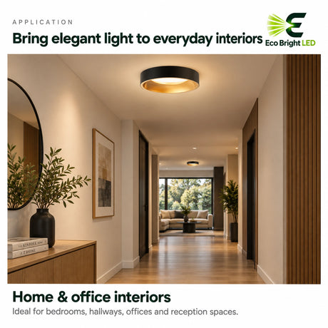 Round 9-inch ultra-slim LED panel light with black trim installed in a warm hallway for home or office interiors