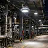 C1D2 explosion proof LED high bay 400W illuminating petrochemical refinery corridor at night with pipes and hazard barriers, 65163lm
