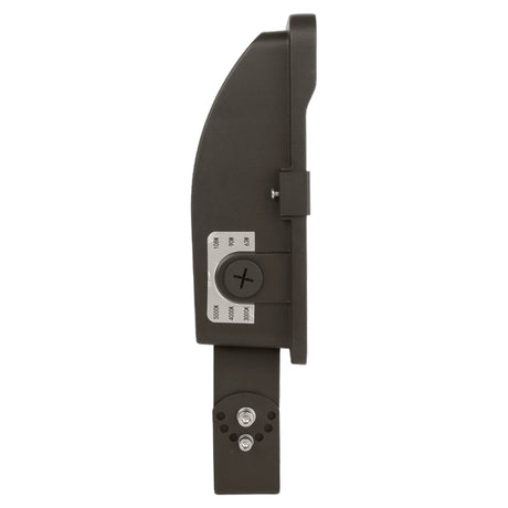 Side view of a black LED flood light with selectable wattage and color temperature labels on the housing