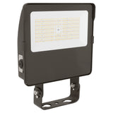 Black LED flood light with selectable CCT and trunnion mount, shown with front light panel and adjustable bracket