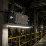 C1D2 LED explosion proof linear fixture illuminating an industrial plant walkway