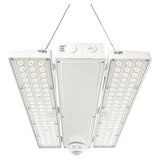 Suspended linear high bay LED fixture with twin side light panels and center sensor housing