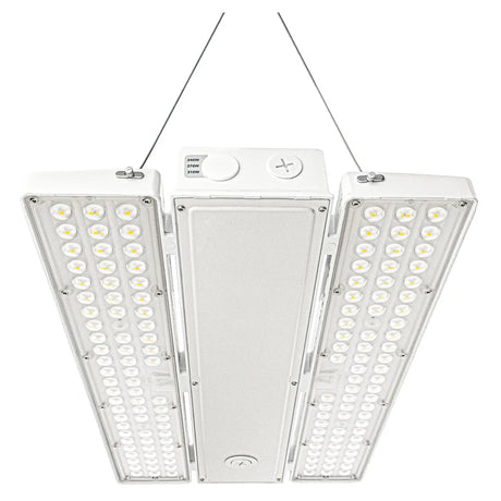 Selectable wattage LED linear high bay light with three-panel design and hanging cables on a white background