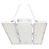 Suspended linear high bay LED light with selectable wattage and dual side light panels for warehouse lighting