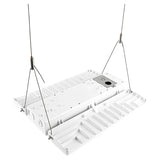 White linear high bay light fixture with hanging cables and finned heat sink for industrial lighting