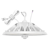 White UFO LED high bay light with hanging hook, power cord, and motion sensor wiring shown on white background